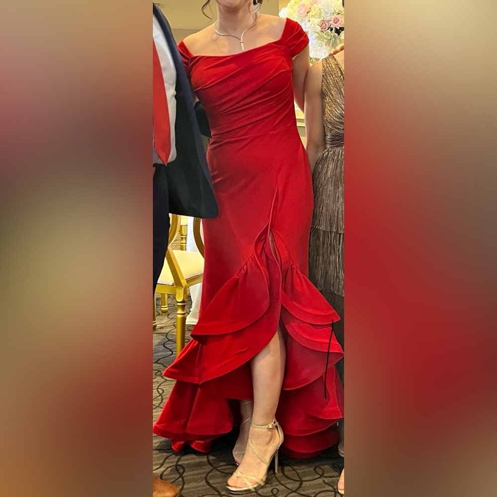 Evening gown with ruffles. Size 6. Perfect condition, worn once for few hours.